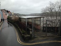 A developer is considering putting 13 two-bedroom dwellings and car parking for 26 cars on an urban waterfront site on the Dart