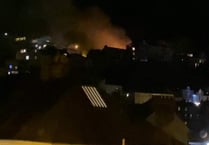 Car, caravan and three properties damaged in fire