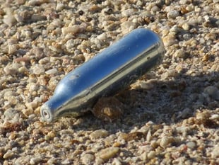Laughing gas binge 'led drug taker to send death threats'