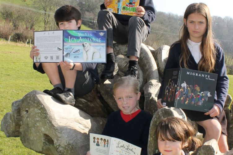 Paige, Hattie, Toby, Rowan and Macie with their diversity texts