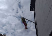 What does the Hanging the Glove Ceremony mean at Fair Week