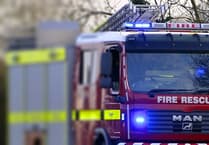 Firefighters tackle Totnes blaze destroying the roofs of two homes