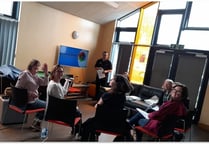 Charity staff receive autism reality training on mobile bus