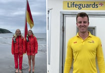 RNLI lifeguards rescue surfer