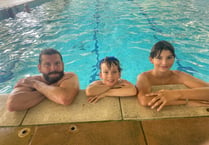 Dad and sons complete swim challenge