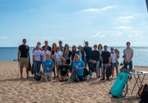 Beach clean prompts talks about pollution