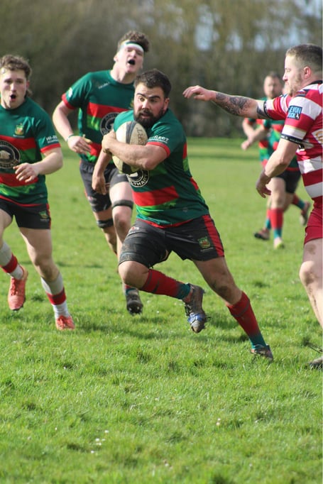 Dartmouth's Capt Karl Caunter leads the Darts attack