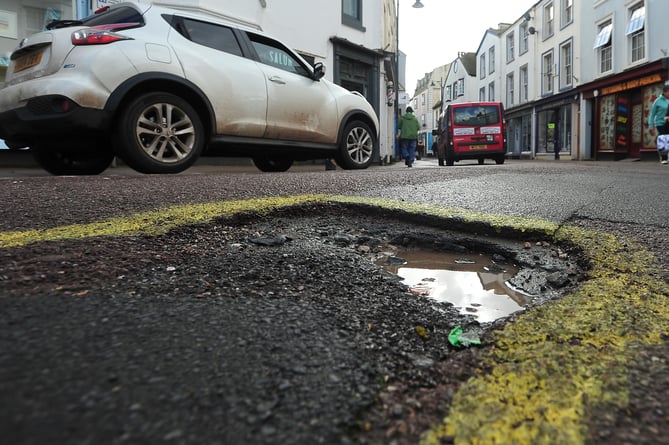 The scourge of driving on Devon's roads -  a pothole