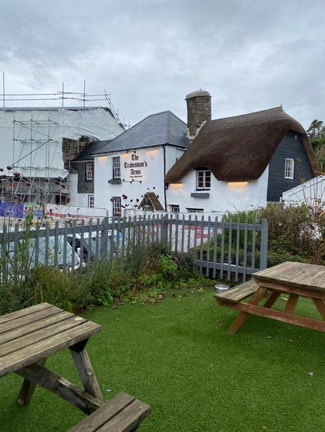 The Tradesman's Arms next to cottages still under reconstruction