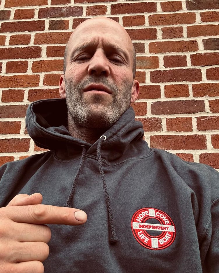 Jason Statham wears Hope Cove Lifeboat hoodie