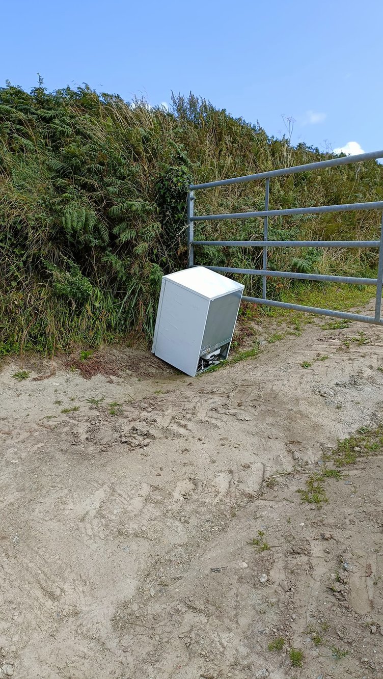 A dumped fridge in a farm in the South Hams