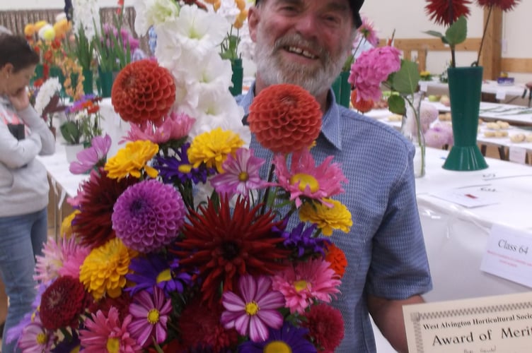 Bob Gould with his spectacular bowl of garden flowers