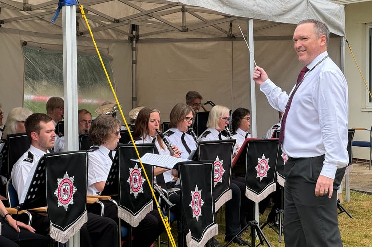 Some of the members of the Devon and Somerset Fire and Rescue Service Band.  AQ 1963
