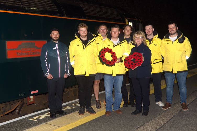 Sleeper Train Host Joe Lorusso with Gaynor Williams RNLI volunteer and the Penlee RNLI crew.  (Picture: RNLI/Phil Monckton)