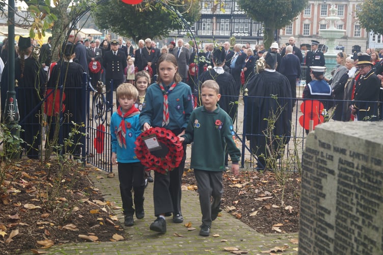 Uniformed young people are amongst those to lay a wreath