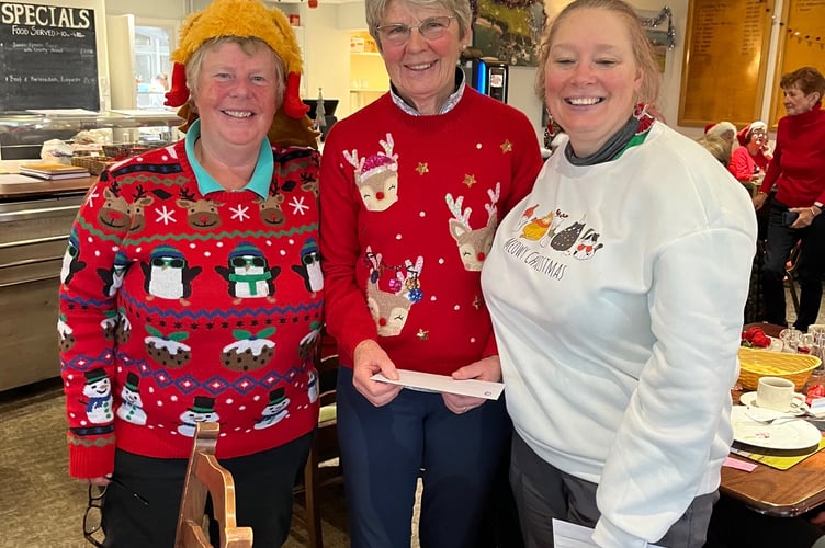 Lady captain Pam Adams (left) with winners of the Turkey Trot, Sally Huntley and Jill Hicks