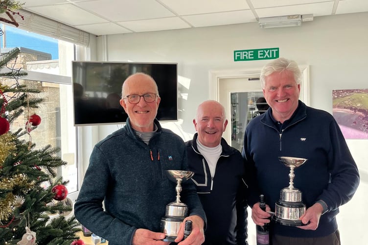 Winners of the Ron Bancroft Cup  David Horne (L) with Steven Gallagher (R) receiving their trophies from Seniors Captain, Gary Keen