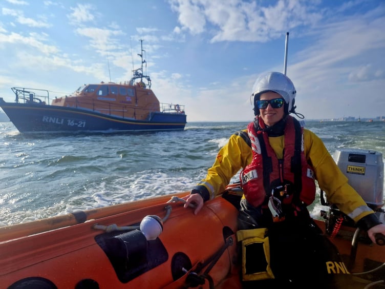Tatty helming D Class with Tamar ALB in the background