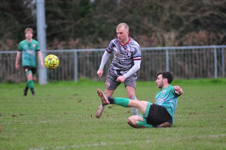 Football.  South West Peninsula League Premier East.  Sidmouth Town versus Bovey Tracey. A 3-0 home win for the The Vikings against visitors Bovey