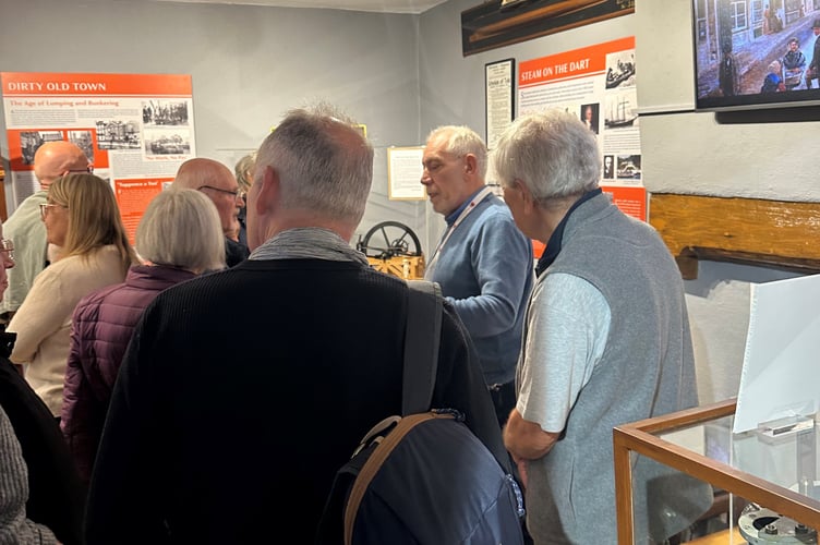 Chair Mike Rowley talks to the visitors