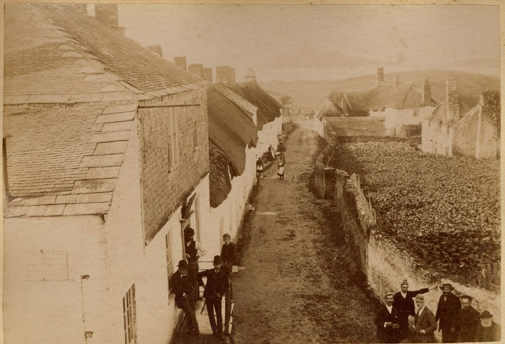 Bantham, showing buildings and small gathering of people