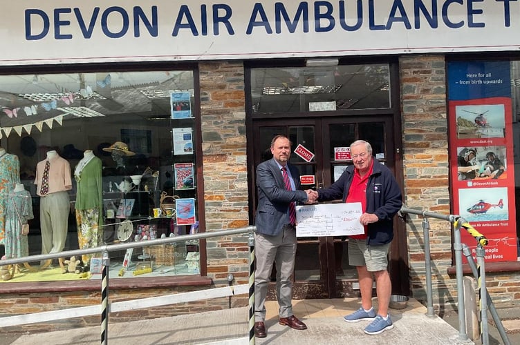 From left: Oliver Williams, Master of Duncombe Lodge in Kingsbridge and Rex Brown, representing Devon Air Ambulance Trust.