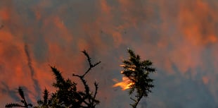 Fire crews tackle huge moorland fire