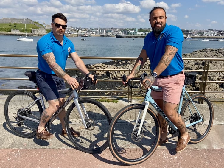 Tugboat & Dolphins fundrasiers Mike Dunn and Jordan Kelevra on the bikes used to cycle to Spain