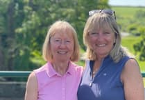 Two Dartmouth Golf Club trophies on the line