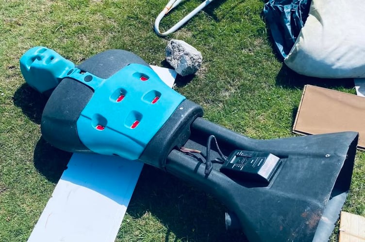 A plastic robot dumped at Cadover