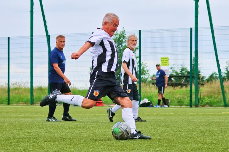 Ashbury walking football action.