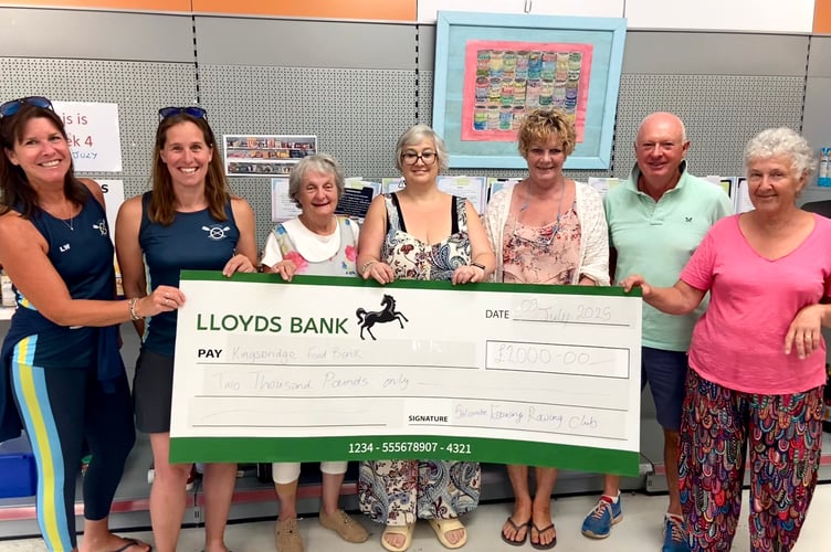 Salcombe Estuary Rowing Club donating £2,000 to Kingsbridge Food Bank. With Lisa (Joint Ladies Captain), Donna (SERC Chair), Eve, Gerry, Paula, Tony and Paula.