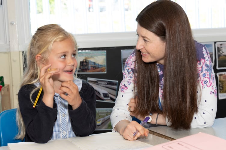 A pupil and teacher