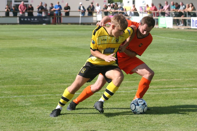 Will Hughes in action for Buckland Athletic