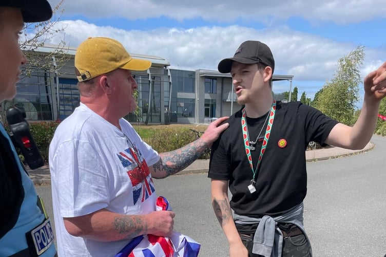 Discussion at Exeter migrant hotel protest (Image courtesy: Name withheld/LDRS use permitted).