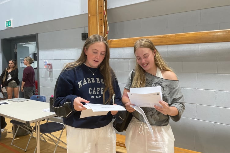 Eleanor C and Iris C celebrate results at PHSG