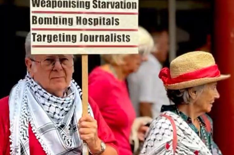 Protesters with their red line