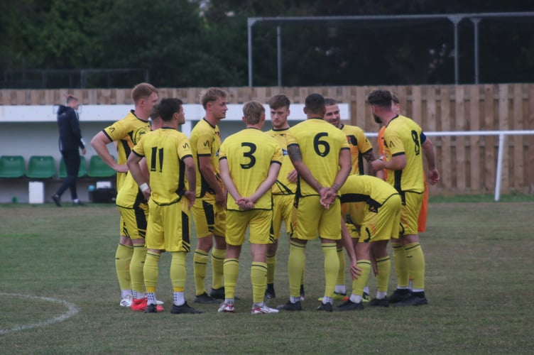 Stoke Gabriel &TP players pre-game against Newton Spurs