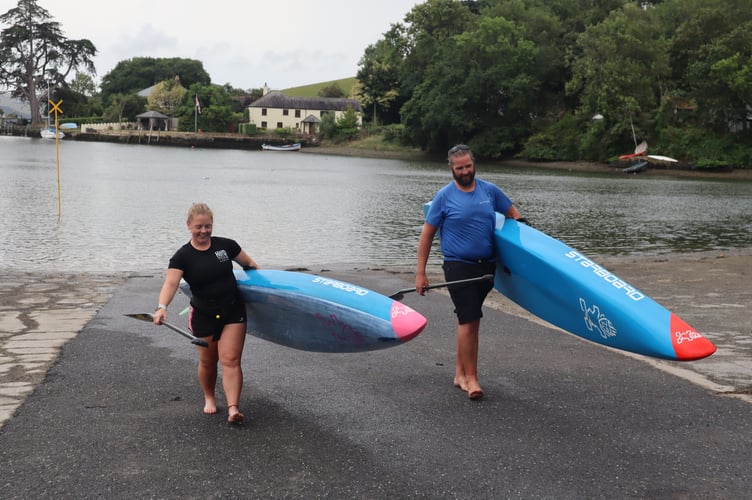 Rachel Booton and Crispin Jones with their SUP boards