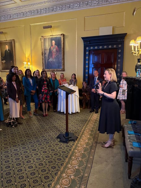 Rebecca Smith MP addresses a group of mainly women