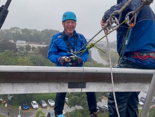 Leap of faith in appalling weather as fundraisers abseil off Derriford