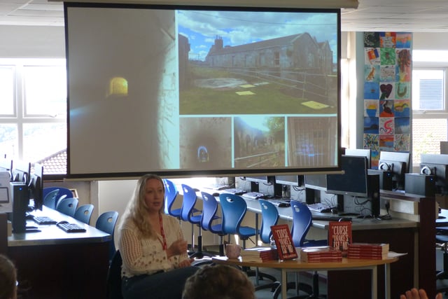 Local author inspires students with reading challenge
