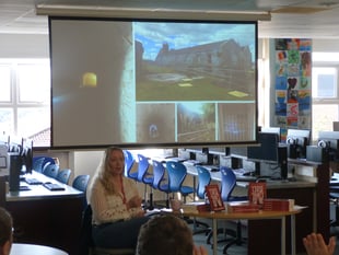 Local author inspires students with reading challenge