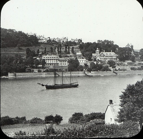 Salcombe from Smalls Cove, three masted ship in the estuary.