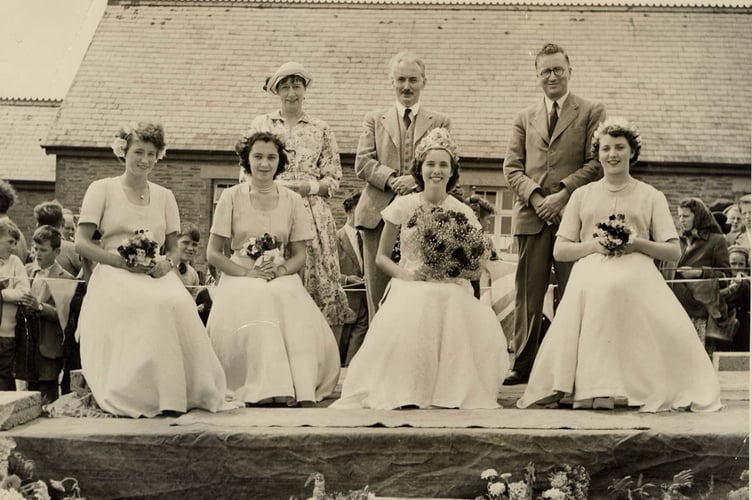 Stokenham Carnival, outside Stokenham Village Hall around 1951. Carnival Queen, with bouquet, Maureen Cooke