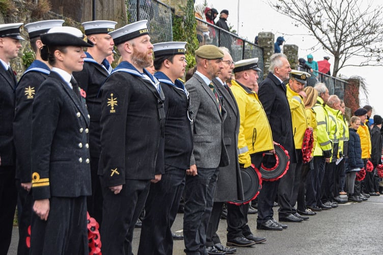The crew of HMS Magpie pay their respects