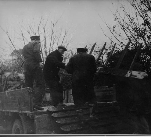 1943 D-Day rehearsal/evacuation - Sailors helping to remove gear from fields at East Allington during evacuation of villages.