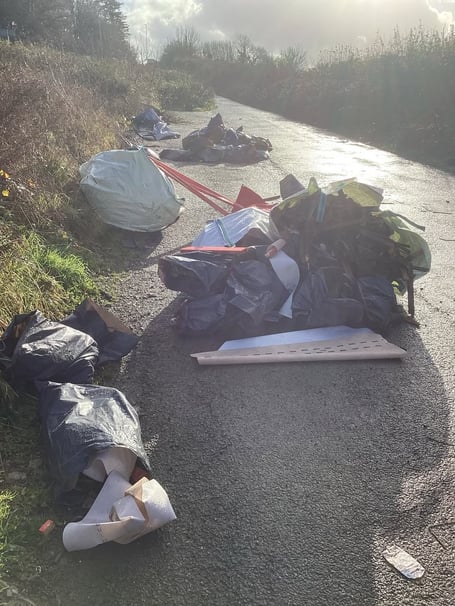 The builders waste fly tipped at Shaugh Prior