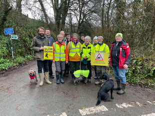Volunteers help toads cross roads