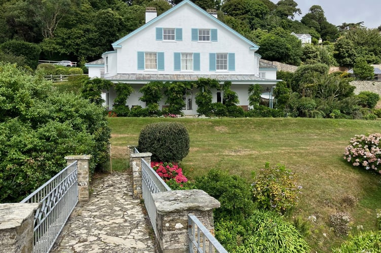 Woodcot from the little bridge over Cliff Road.